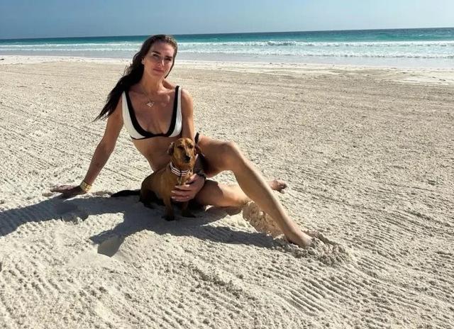 The presence of the dog not only added an extra layer of charm to the photos but also reminded her audience that despite her celebrity status