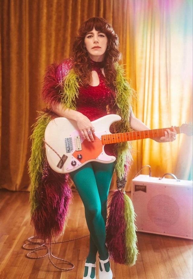 With her electric guitar and fierce look, Jenny Lewis shows she’s a force to be reckoned with on stage.
