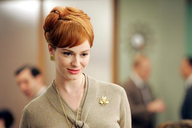 As the red-haired, sophisticated office manager at the Sterling Cooper ad agency, Joan became a symbol of both feminine strength and vulnerability