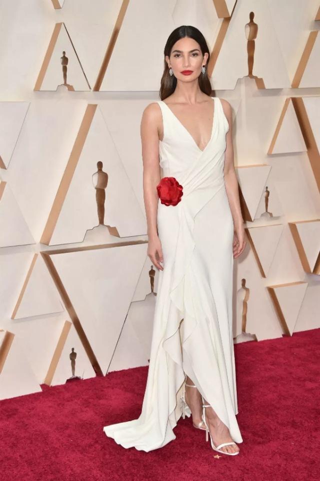 Model Lily Aldridge went all-in on sustainability, appearing first in an archival Ralph Lauren gown from 2013