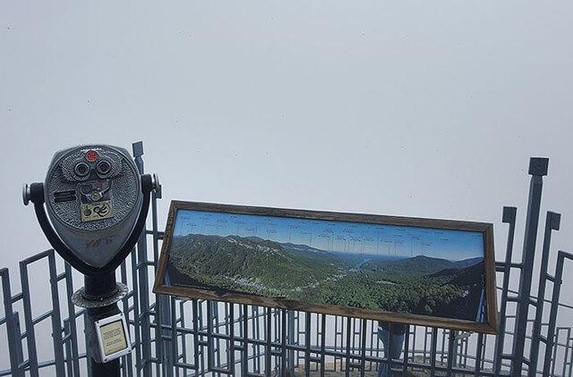 A hike in search of a beautiful view, but fog ruins everything.