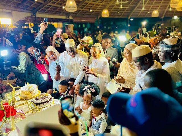 A joyful and vibrant birthday celebration for the Nonuplets, with cake, smiles, and a festive atmosphere.