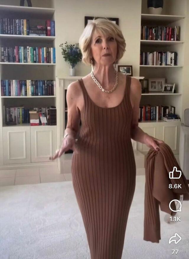 A snapshot from the viral video showing a stunning woman in her 70s facing harsh judgment for her attire.
