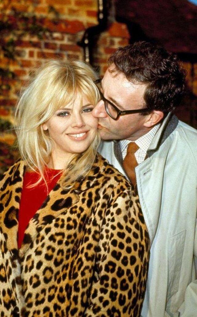 Britt Ekland and her partner, sharing a tender moment together. 