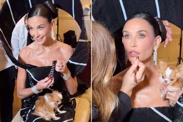 Her hair was styled in a sleek, polished bun that allowed the gown to take center stage.