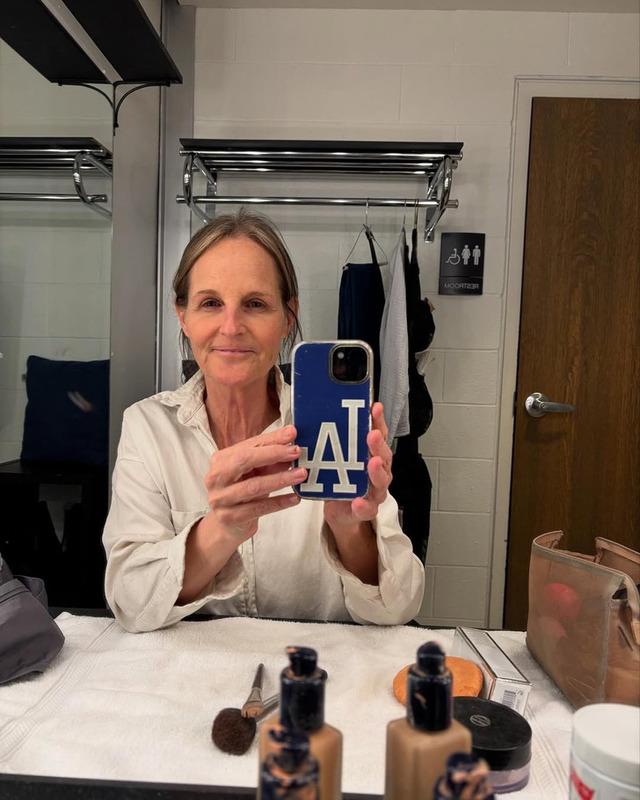 It was a candid, unfiltered shot of Hunt backstage, wearing a white shirt with her hair tied back—no makeup, no filters, no glitz.