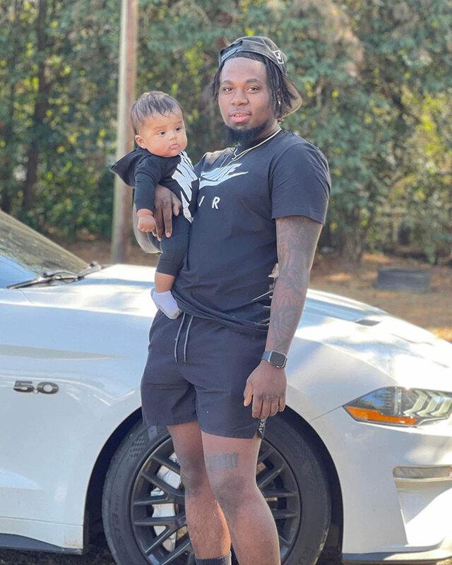 Julian Williams and his 18-month-old son.