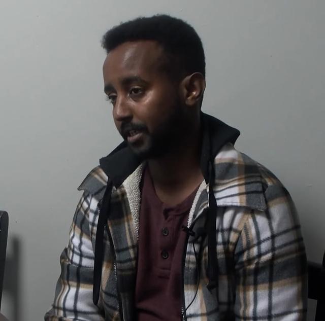 Sharmake Omar intervened and confronted the woman about her racist remarks.