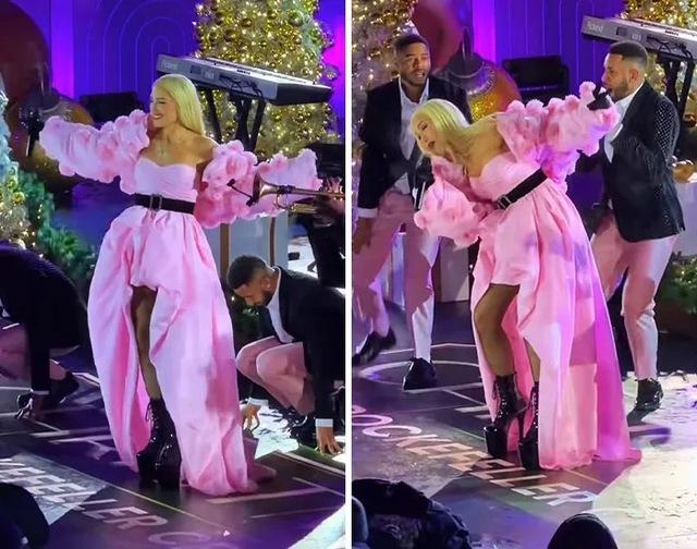 The 56-year-old singer opened the show in a bright pink ensemble that featured an off-the-shoulder, deep neckline paired with an asymmetrical skirt that showed off her legs