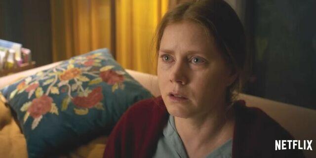 The Woman in the Window (2021): A Strong Performance Lost Inside a Disordered Narrative