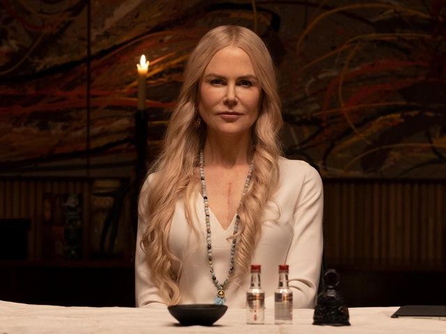 The actress rejects traditional gowns in favor of a tailored black pantsuit, a symbolic move toward modern power-dressing.