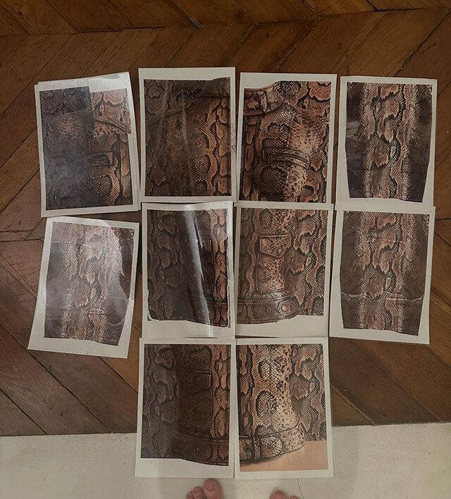 Carle was seen meticulously trimming the edges of the snakeskin decals to perfectly outline Tyla’s torso, ensuring the "outfit" adhered to every curve