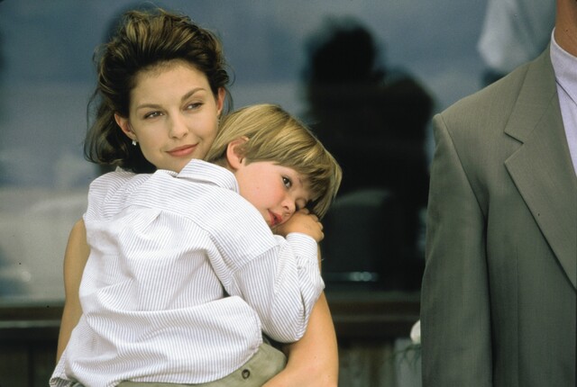 Learning that Nick is not only alive but has staged his death to collect a massive insurance payout—and has stolen their son away—transforms the story