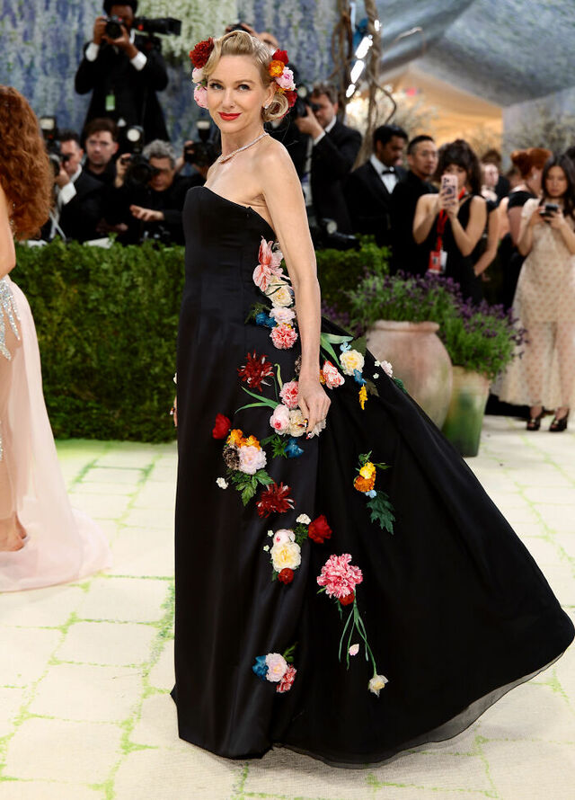 Naomi Watts: A whimsical botanical dream covered in vibrant floral appliqués.