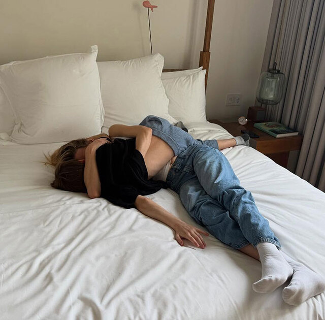 Another intimate bedtime photo shared by Jenny Mollen that fueled the growing online debate over parent-child boundaries.