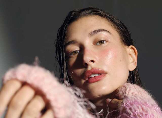 The Clean Girl look insisted on sleek bun hairstyles, perfectly flushed dewy cheeks, flawless skin, and an aggressively curated lifestyle that signaled optimal health and wellness.
