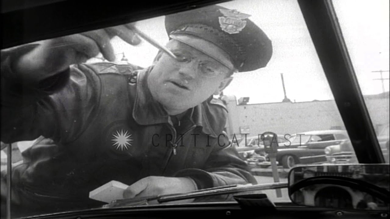 Scientists study pock marks on windshields of cars in Seattle. HD Stock Footage